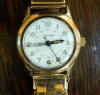 Longines gold watch