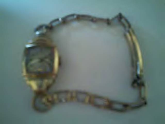 1858 LADIES  GOLD WATCH