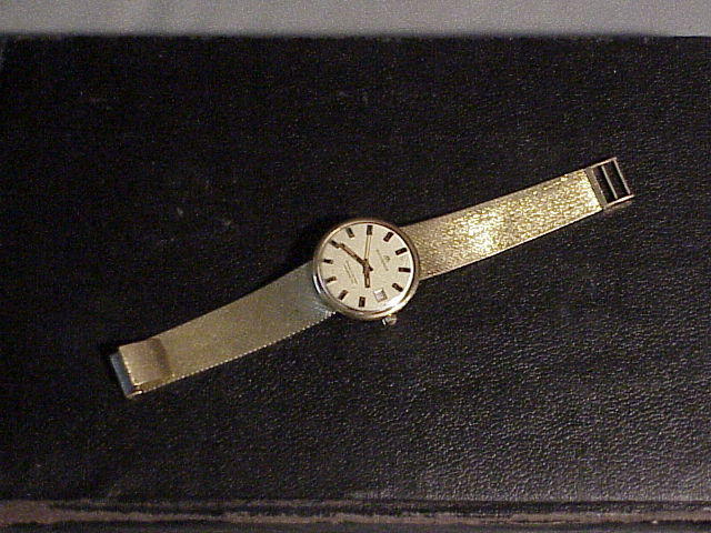 Man's Bucherer 18K watch